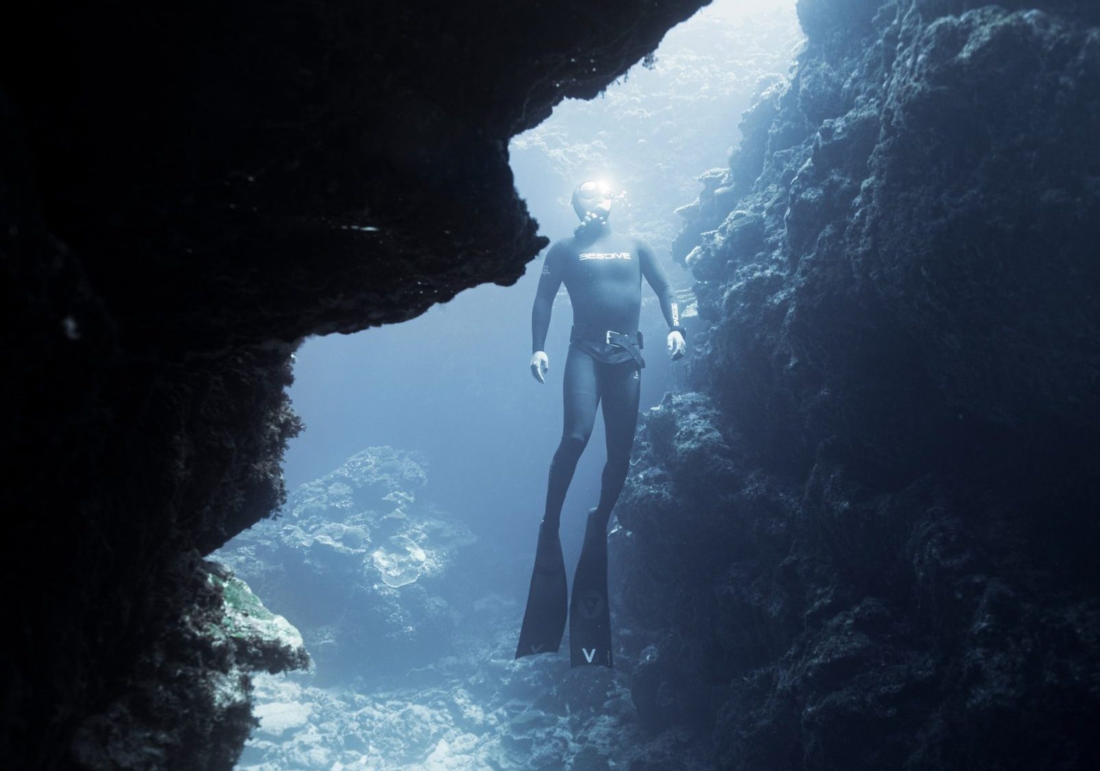 free diver near coral reef