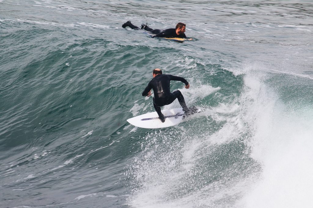 Surfing in gul wetsuits
