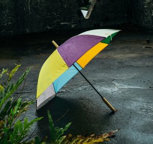 umbrella on the ground while it's raining